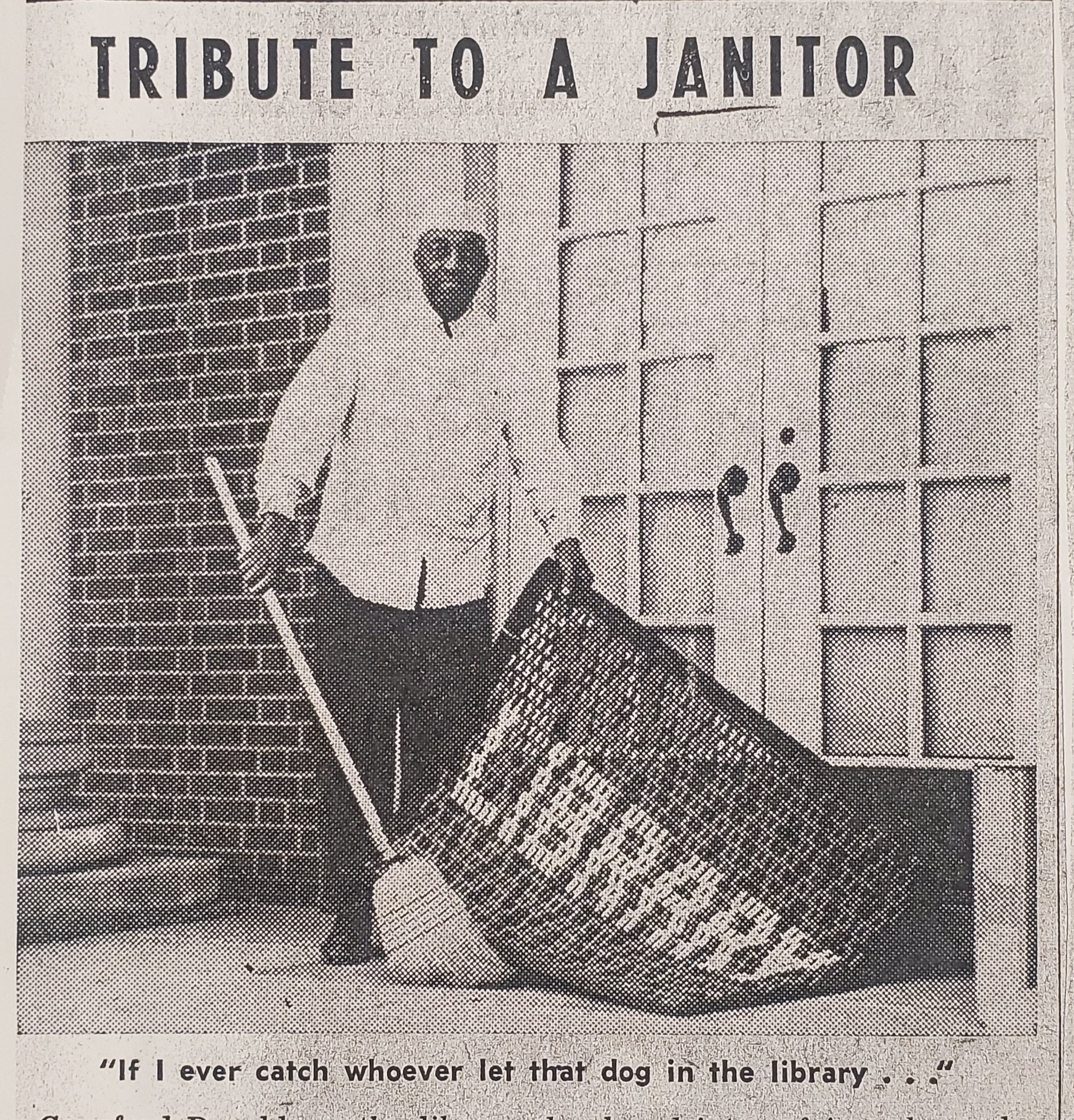 Donaldson holding the front entry mat with a broom in hand.