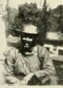 Andy Falls sitting in 1915 Quips and Cranks group photo